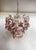 Vintage Italian Murano chandelier in Vistosi style. The chandelier has 36 fantastic Murano white and pink glasses...