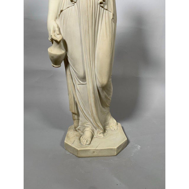 A superb early 19th-century neoclassical sculpture in white marble depicts Hebe, goddess of youth and daughter of Zeus....