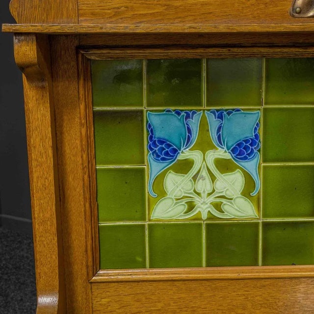 A superb Late Victorian oak, Arts and Crafts washstand with a unique marble top that shows a large amount of different...