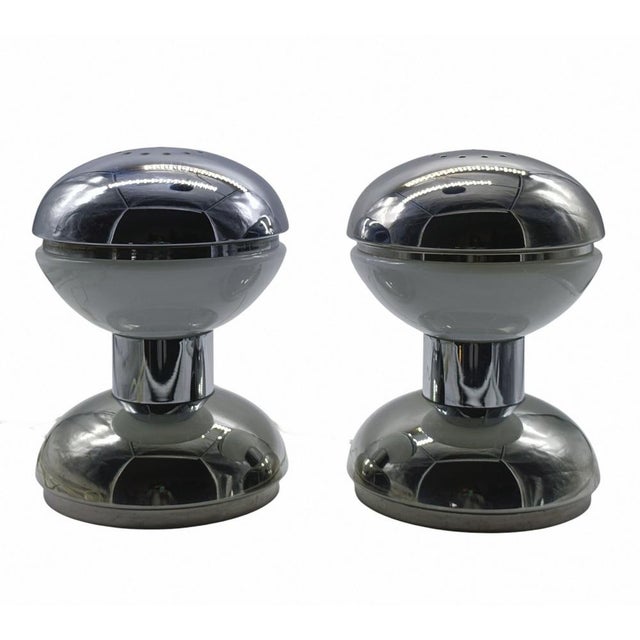 Pair of Space Age table lamps in chrome-plated metal and opal glass, designed by Goffredo Reggiani and manufactured by...