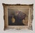 A quiet still life of an earthenware vessel, draped linen and a ceramic pitcher in warm umbers, ochres and soft shadow....