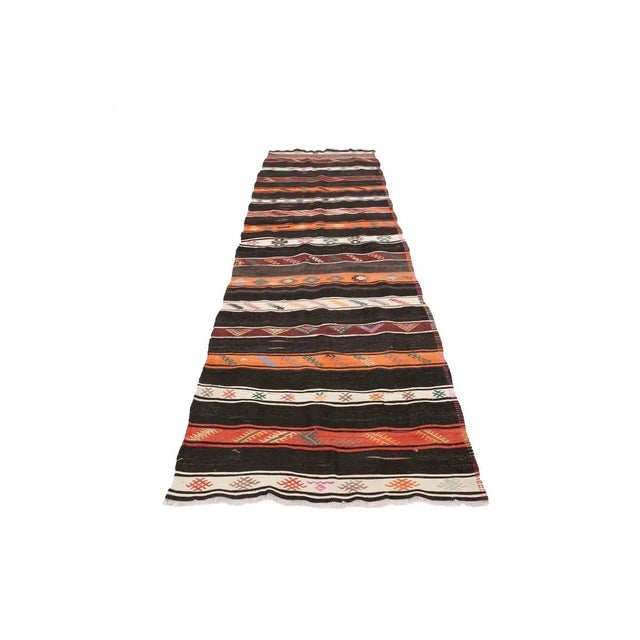 Vintage handwoven decorative kilim rug from Afyon region of Turkey. Approximately 50-60 years old. In very good condition.