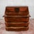 This collectible desk dating back to the early 19th century stands out for its curved lines and the understated charm...