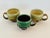 Ryan J. Greenheck Studio Pottery Mugs, Set of 3. Hand made by this Philadelphia potter. One solid green mug and other two...
