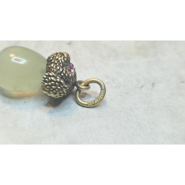 Metal Early 20th Century Imperial Gilt Silver Egg Puppy Pendant With Ruby Eyes by Theodore Ringe For Sale - Image 7 of 10