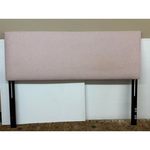 Design Plus Gallery presents the Rose Quartz Olivia California King Headboard from Skyline Furniture. Simple elegance for...