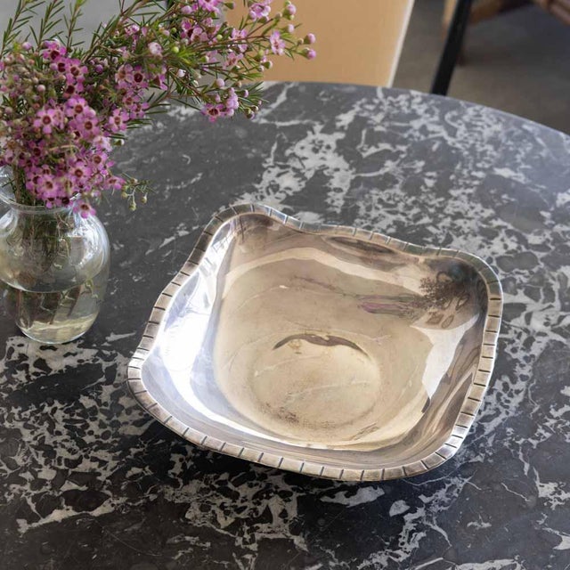 Lovely Art Deco alpaca metal decorative bowl from France, 1930s. Beautiful piece with square shape bowl and wavy edge....