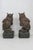 This lovely pair of bookends / sculpture is made of metal. This unique pair of bookends is a depiction of owls sitting on...