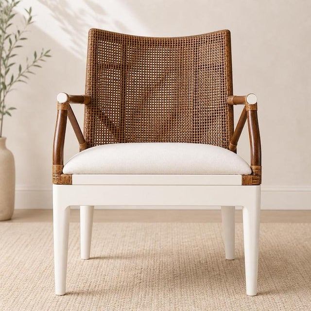 Materials: Cotton, foam, mahogany, rattan Overall width: 21.5 inches Overall height: 34 inches Overall depth: 23.5 inches...