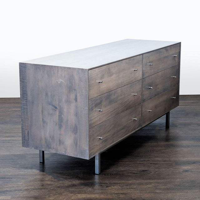 Spacious and sturdy, this Room & Board dresser offers six roomy drawers for all your storage needs. The dresser features a...
