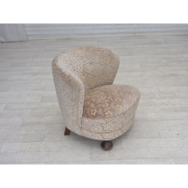 1970s, Danish curved armchair. Original light green/gray furniture velour, oak wood legs, springs in the seat. Original...