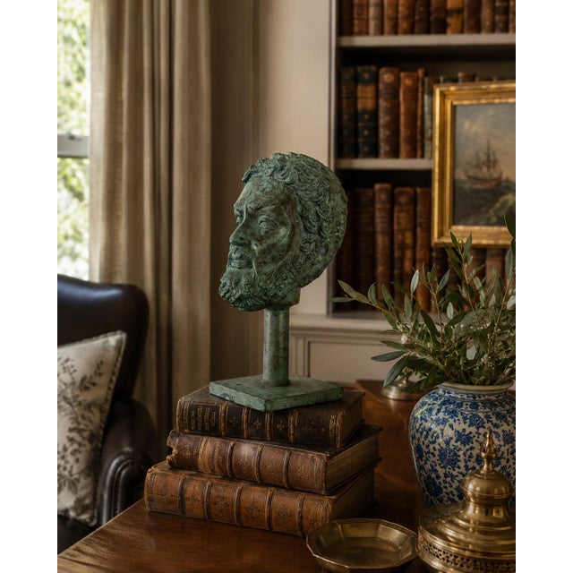 A finely cast bronze bust of Plato with a beautifully aged verdigris surface, mounted on an integral stand for display....