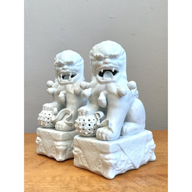Chinoiserie Vintage Blanc De Chine Porcelain Foo Dogs - Pair For Sale - Image 3 of 12