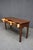 Ethan Allen cherry console table featuring four dovetailed drawers with original brass bail pulls. The table has a...