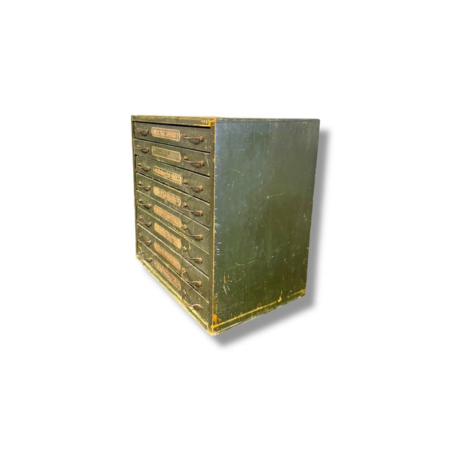 This authentic vintage music wire spring cabinet is a unique industrial storage piece featuring multiple shallow drawers...