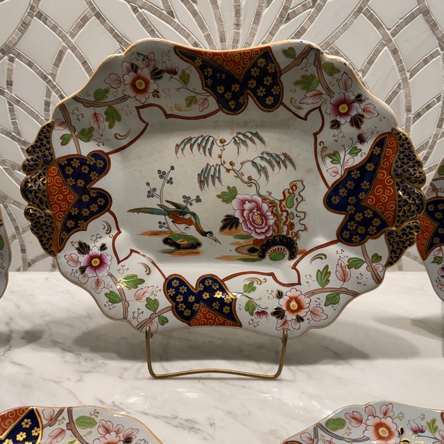 Rare set of six matching English Imari wide-rimmed soup bowls and one serving platter. Late Victorian c. 1865-1885 and...