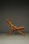 A unique sculptural lounge chair constructed from sections of beech wood connected using metal bars with bolts as...
