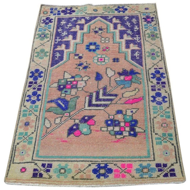 Hand-knotted with care using traditional rug-making techniques, this wool rug blends timeless craftsmanship with a modern...