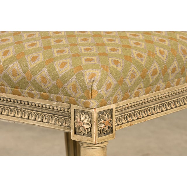 A refined set of six late 19th century French Louis XVI style dining chairs, sourced in Provence, France. The chairs...