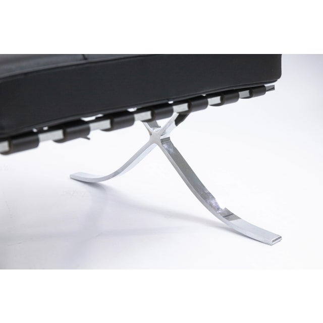 A Mies Van Der Rohe Barcelona style ottoman. This is great contemporary modern ottoman featuring a classic mid century...