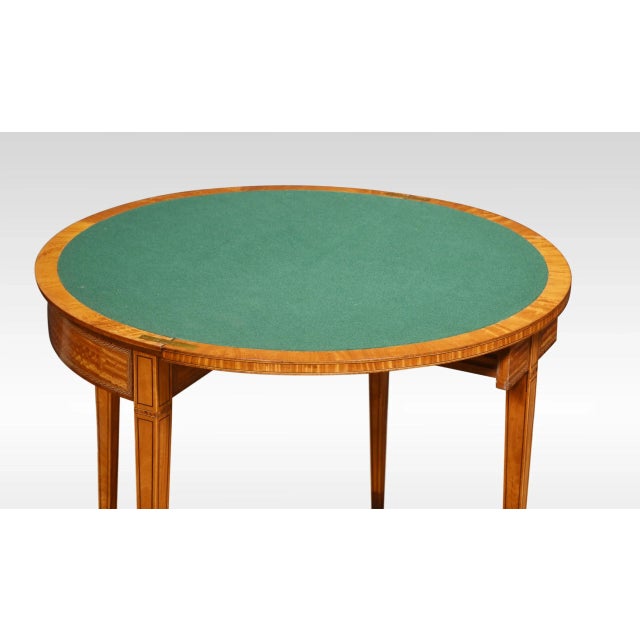 19th century card table the satinwood top with banding. To the fold-over top opening to reveal the inset green baize card...