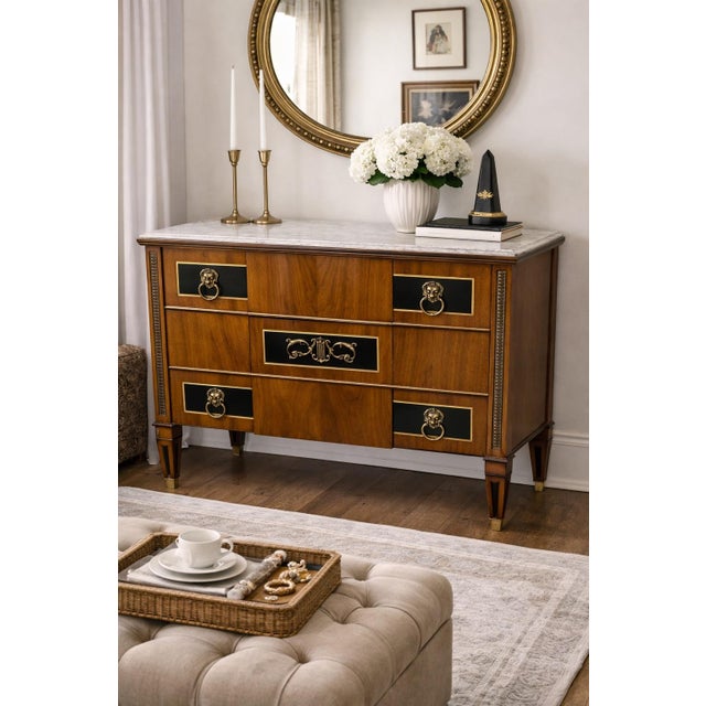 A stunning and highly collectible John Widdicomb Company marble-top chest, showcasing elegant Neoclassical and Regency-...