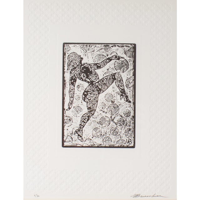 An intaglio print with embossed border by American artist Martin Barooshian (1929-2022). This abstract work depicts the...