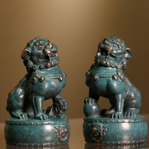 This is a striking pair of vintage bronze guardian lions, also known as Foo Dogs or "Oriental Awakening Lions." Each lion...