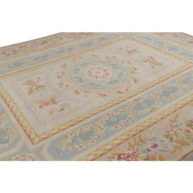 Hand-knotted in wool from France circa 1890-1900, this 10x13 Antique French Savonnerie rug in the Neoclassical style is a...