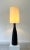 An important black glazed ceramic table lamp/floor lamp, France circa 1990. A very spectacular and decorative lamp!...