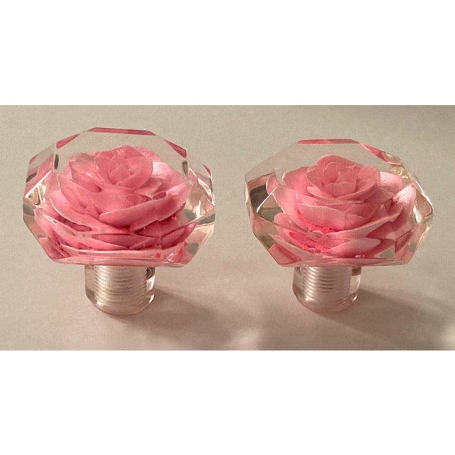 Reverse carved bubble gum pink rose imbedded in clear lucite. A myriad of uses where knobs or pulls are present. Install...