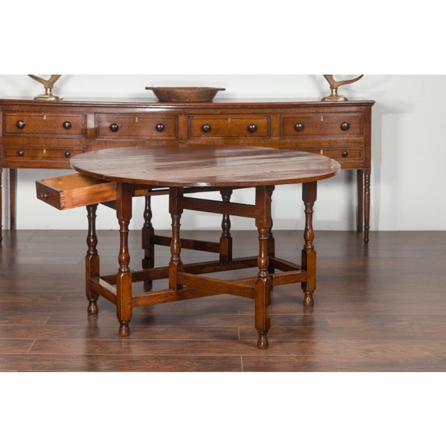 Brown English Oval Oak Drop-Leaf Table with Single Drawer and Baluster Legs For Sale - Image 8 of 11