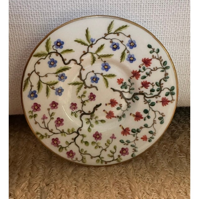 An exceptional, investment-grade set of twelve (12) fine French porcelain [plates/saucers] designed exclusively for the...