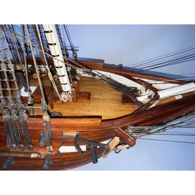 Fine scale model of the American frigate USS Constitution. Planked hull with varnish finish. Clove hitched shrouds,...