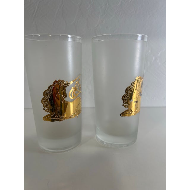 A wonderful pair of Culver high ball tumbler glasses with 22k gold painted unicorns on frosted glass. This pair is vintage...