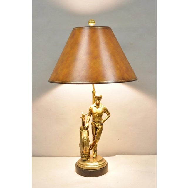 Vintage Maitland Smith Bronze Figure Golfer Sculpture Table Lamp with Original Brown Tooled Leather Shade. Circa Late 20th...