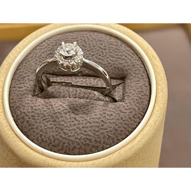 Diamond 0.5 Carat Traditional Ring/Band 14 Karat White Gold, Halo Ring one 25 pointer Brilliant cut round diamonds...