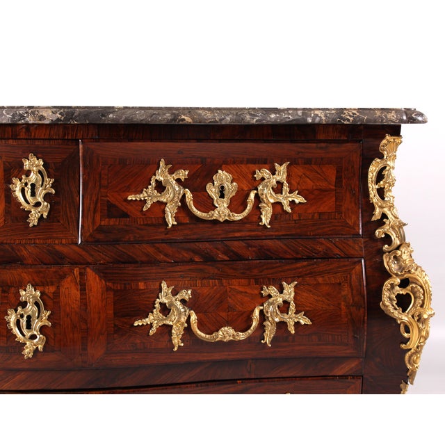 Antique louis xv chest of drawers with fire-gilt fittings paris around 1750 dimensions: h x w x d: 85 x 132 x 64 cm : very...
