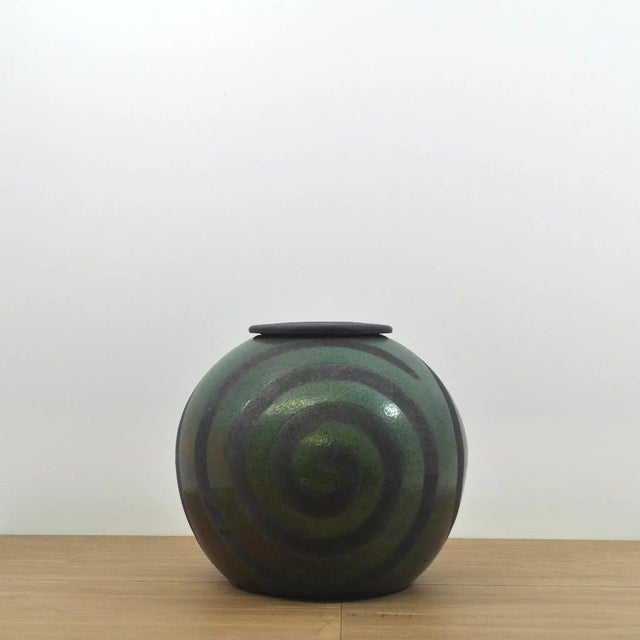 Mid-Century Modern Japanese Raku Ceramic Vessel With Lid. Hypnotic swirl pattern with subtle iridescent glaze.