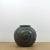 Mid-Century Modern Japanese Raku Ceramic Vessel With Lid. Hypnotic swirl pattern with subtle iridescent glaze.