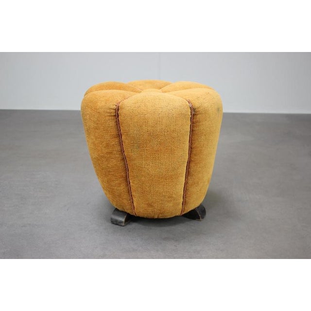 Original Mid-Century upholstered footstool (tabouret) designed by Jindřich Halabala and produced in Czechoslovakia during...
