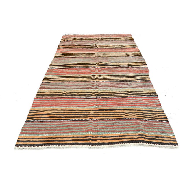 Handwoven vintage striped kilim rug from Denizli region of Turkey. Approximatelly 45-55 years old. In very good condition.