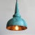 Hand pounded copper lantern with beautiful verdigris patina on the exterior with true copper finish on the interior. The...