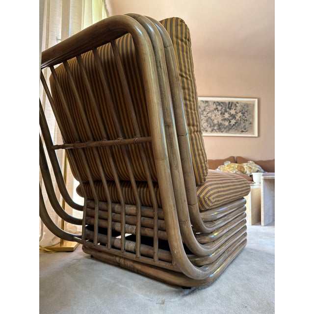 First imagined by Italian maker Gabriella Crespi, the Bohemian 72 Lounge Chair is crafted from rattan-embodying the...