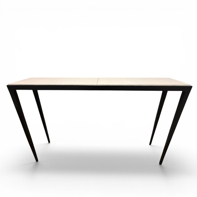 Stunning custom table by legendary designer Christian Liaigre (French, 1943-2020). The Parchemin table is comprised of a...