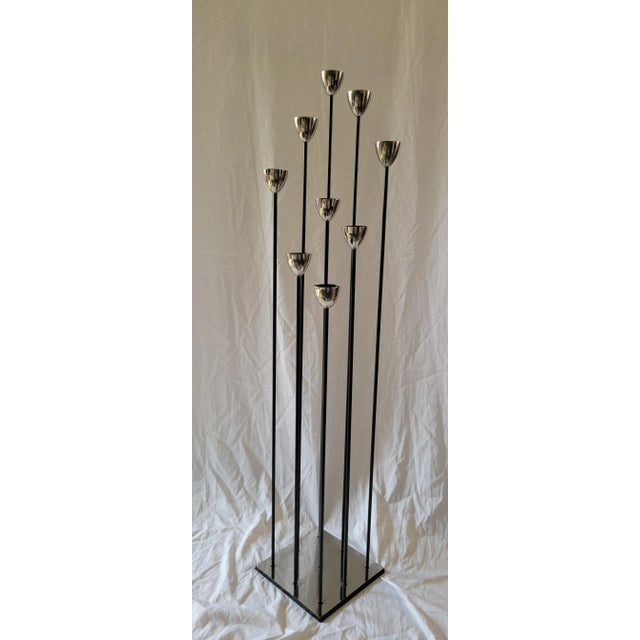 Vintage modernist floor length candelabra in the style of Bertoia. Features a square chrome base and heads, with wrought...