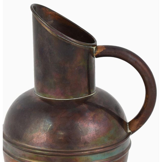 Copper jug is an original decorative object realized in the first years of the 20th century. Original copper. Realized by...