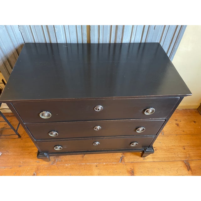A magnificent chest of drawers from the early 1800s from the Netherlands. It is a somewhat smaller model but grand in...