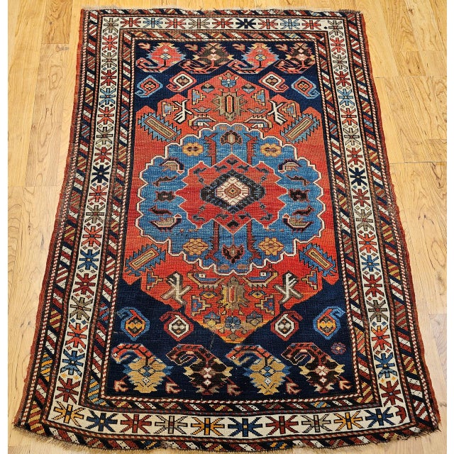 An extraordinary late 19th century Caucasian Kazak area rug, celebrated for its exceptionally rare medallion design that...
