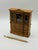 A finely crafted vintage Shackman dollhouse miniature hutch cabinet, made in real wood with glass-front doors and detailed...
